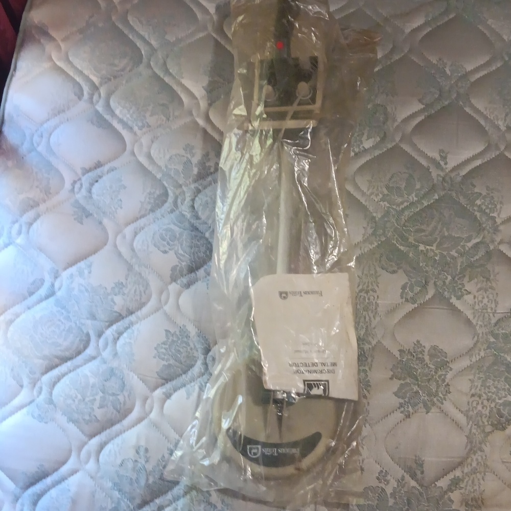 An antique 1970 discriminator metal detector.